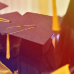 shot above caps and gowns | How Employers Should Verify College Degrees of Candidates | Barada Inc.