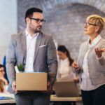 Man leaving office building